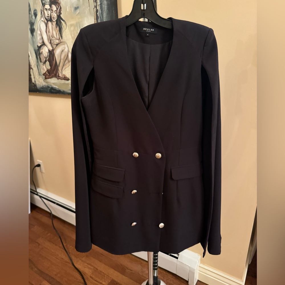 Women dress or top with a cape